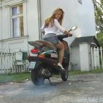 photo of a girl on a scooter
