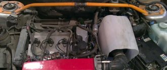 Location of the expansion tank VAZ 2110-12